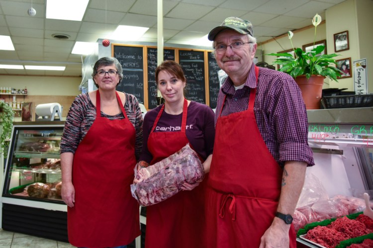 Emery's Meat & Produce in Gardiner is a family affair. Leon Emery, right, started the business, and is joined by his daughter Jessica Peavey and his wife, Denise Emery, left. It is a popular spot for locally grown food.