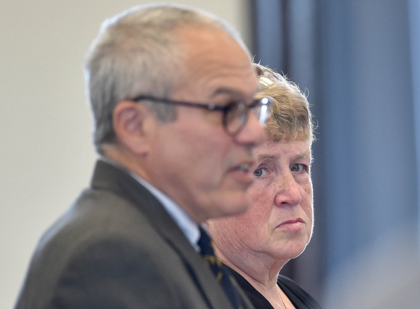 Julie Smith, right, stands with her attorney Woody Hanstein in Somerset County Superior Court in Skowhegan in May when she pleaded guilty to embezzling $90,000 from the Somerset County office of district attorney.