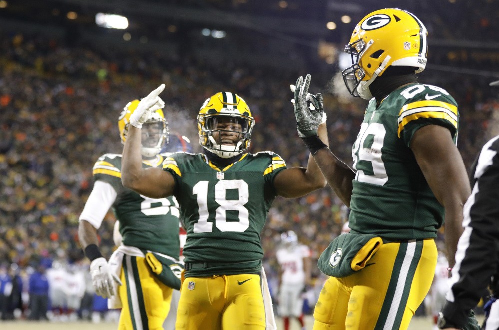 Green Bay Packers wide receiver Randall Cobb celebrates his third toudndown of an NFC wild-card game against the New York Giants on Sunday.
