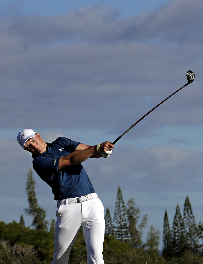 Jordan Spieth hits from the fourth tee during the final round of the Tournament of Champions on Sunda in Kapalua, Hawaii.