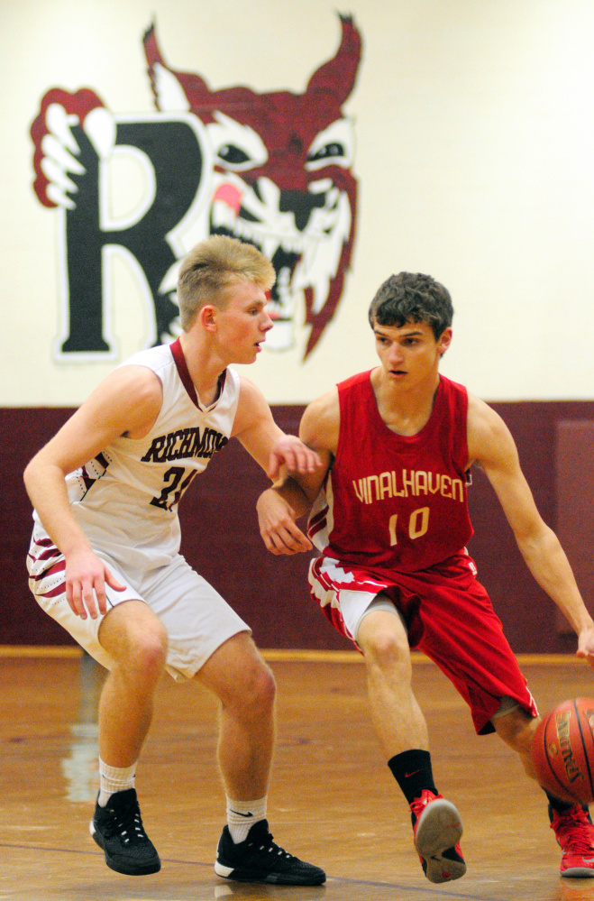 Richmond's Brendan Emmons, left, defends Vinalhaven's Max Stanley during a game Friday in Richmond.