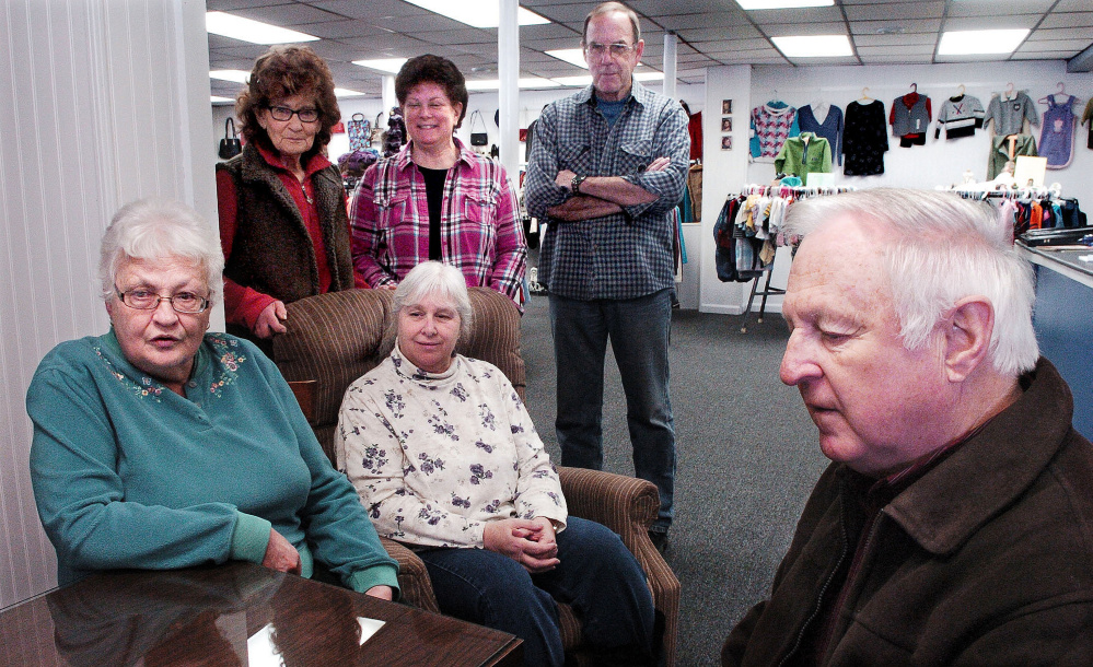 Volunteers with the new St. Peter's Thrift Store and Food Pantry in Bingham discuss the opening of the store at the former Jimmy's Market on Main Street on Wednesday. In front from left are Violet Tibbets, Aldea LeBlanc and Jim West. In back row from left are Carolyn Fultz and Marsha and Sonny Lagasse. The store will be open Thursdays and Saturdays from 10 a.m. to 2 p.m.