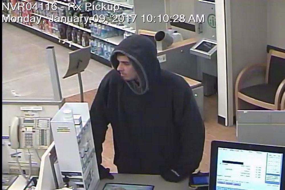 A Rite Aid surveillance photo shows the man police believe robbed the Skowhegan pharmacy Monday morning. Authorities last week identified the suspect as Damien Towers and have issued a warrant for his arrest.