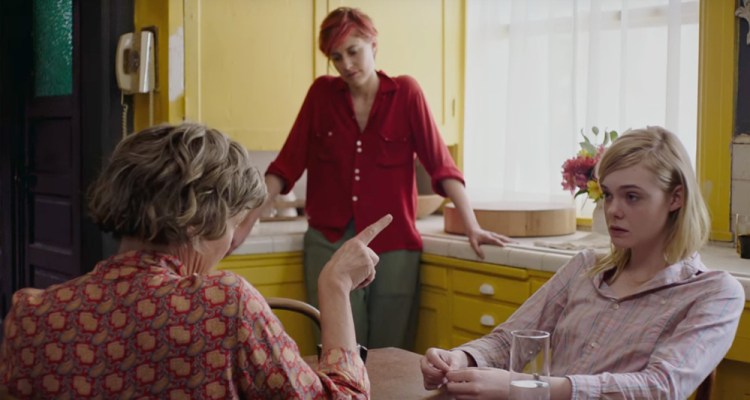 Annette Bening (Dorothea) talks with Elle Fanning (Julie) with Greta Gerwig (Abbie) in the background in "20th Century Women."