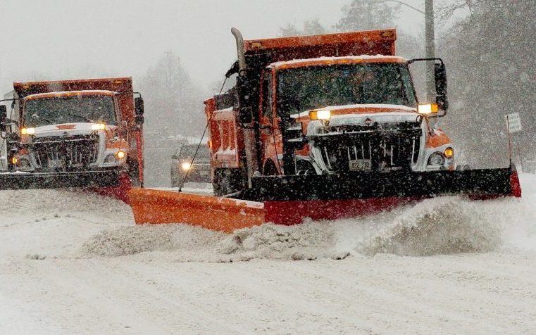 Waterville Public Works snowplow operators work side by side on College Avenue in Waterville on Dec. 12. Forecasts call for 3-6 inches of snow Tuesday into Wednesday as a nor'easter moves through the region.
