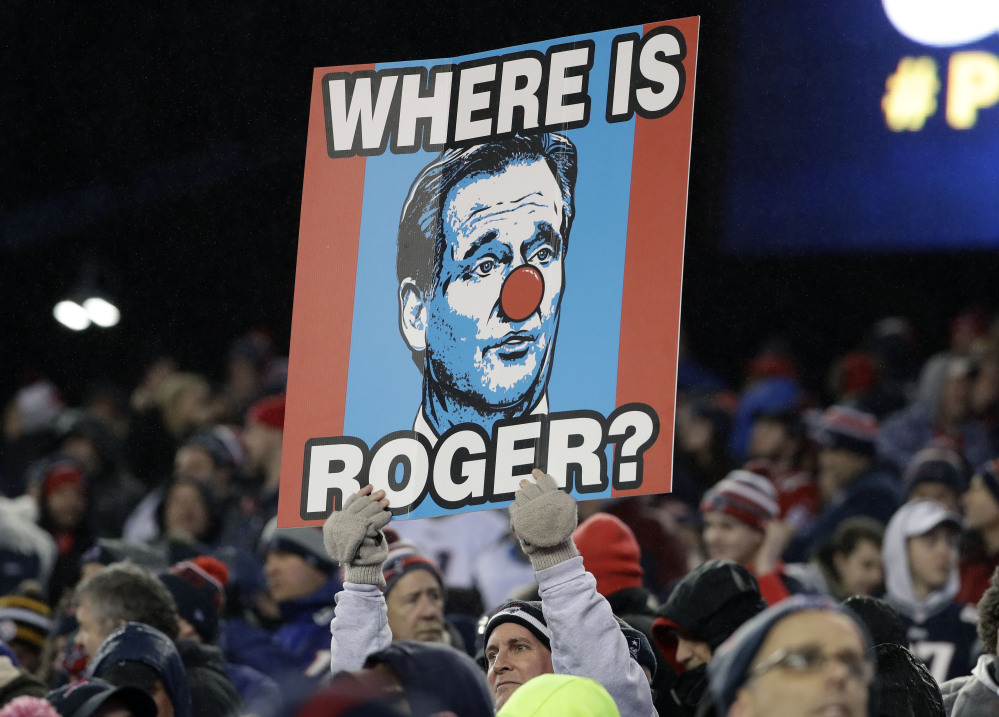 A New England Patriots fan holds a sign referring to NFL commissioner Roger Goodell during the the AFC championship NFL game Sunday in Foxborough, Massachusetts.