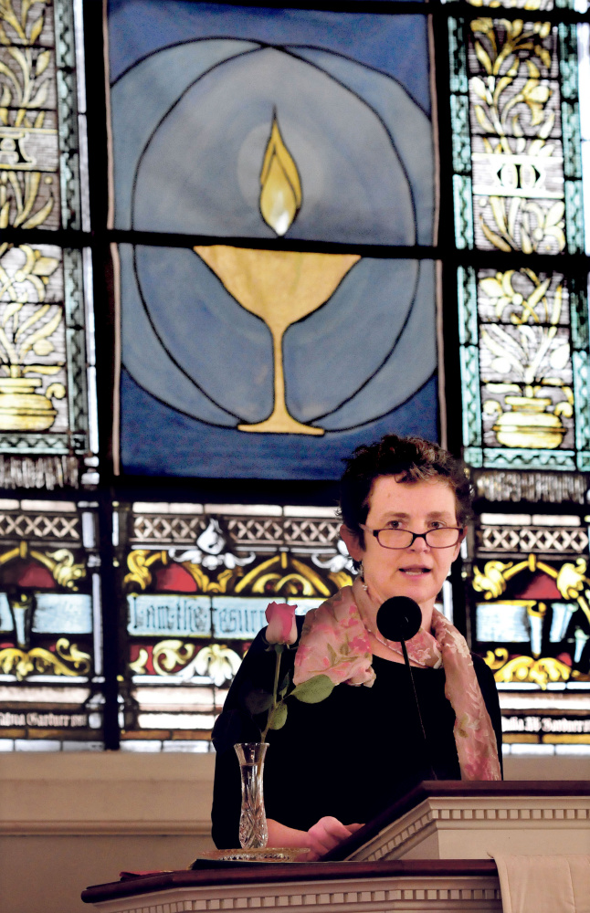 Kate Braestrup, a game warden and chaplain, speaks to parishioners at the Universalist Unitarian Church in Waterville on Sunday.