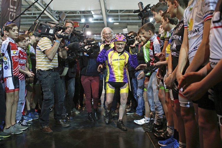 Robert Marchand, 105, arrives to begin his bid to beat his record for distance cycled in one hour, at the velodrome of Saint-Quentin en Yvelines, outside Paris, Wednesday. <em> Associated Press/Thibault Camus</em>