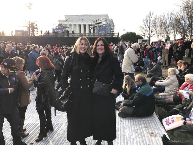 Laura Zajac, right, and Julie Sheehan, both of Cape Elizabeth, pose for a photo in front of the Lincoln Memorial in Washington, D.C., on Thursday evening. 