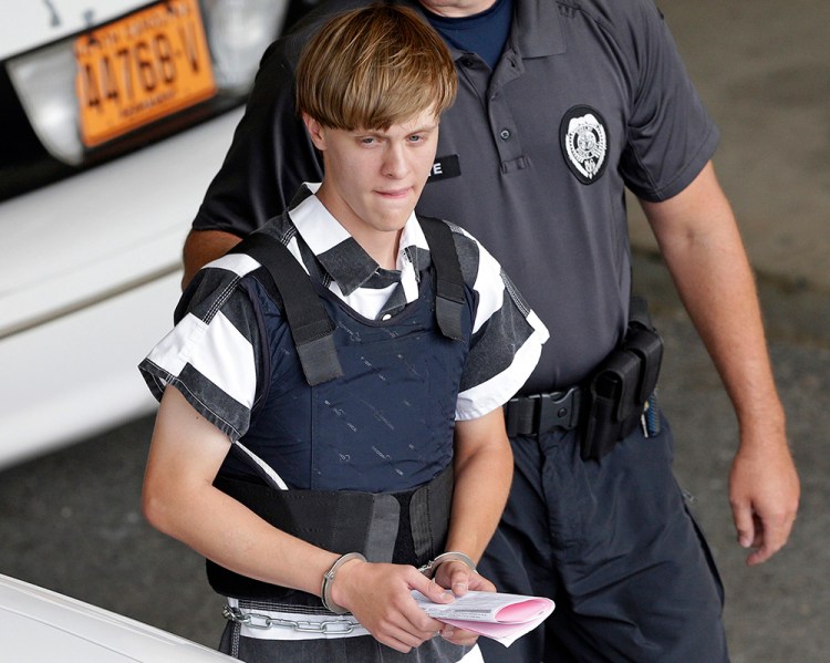 Dylann Roof is escorted from the Cleveland County Courthouse in Shelby, N.C., on June 18, 2015. The sentencing phase of Roof's federal trial began Wednesday in Charleston. He could face the death penalty or life in prison. <em>Associated Press/Chuck Burton</em>