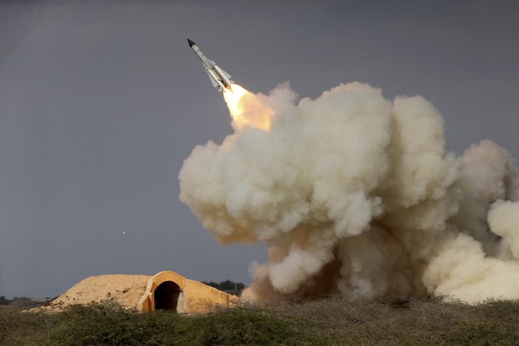 A long-range S-200 missile is fired in a military drill in the port city of Bushehr, on the northern coast of the Persian Gulf in Iran in December 2016. Iran has test-fired various ballistic missiles since the July 2015 nuclear deal with world powers. Iran says they don't violate any strictures because they aren't designed to carry nuclear warheads.
