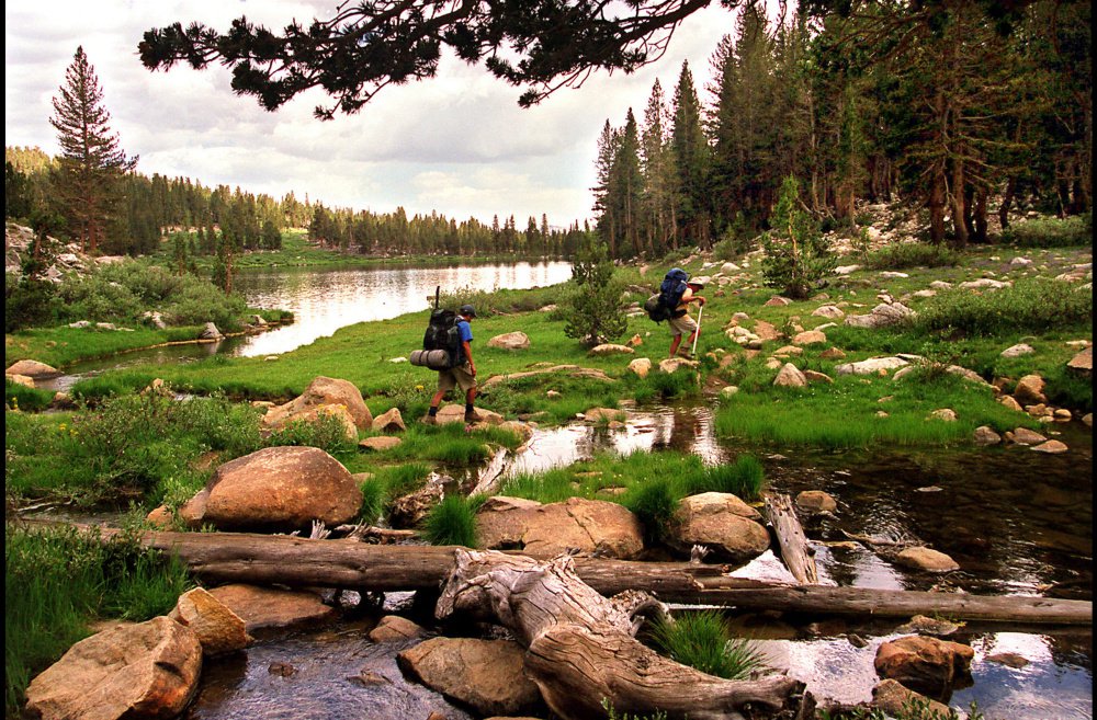 Backpackers enter Sallie Keyes Lakes from Selden Pass along the John Muir Trail. A new study suggests that a couple days of camping in the great outdoors can reset your circadian clock and help you get more sleep.