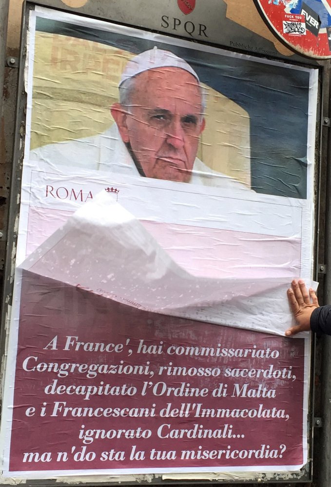 On Saturday, posters appeared around Rome featuring a stern-looking Francis and questioning, "Where's your mercy?"
