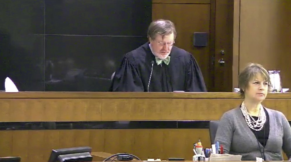 Judge James Robart listens during a case at Seattle Courthouse in 2013 in Seattle. Robart placed a nationwide hold on President Trump's executive order banning  travel to the United States by migrants from seven Muslim-majority countries on Friday.