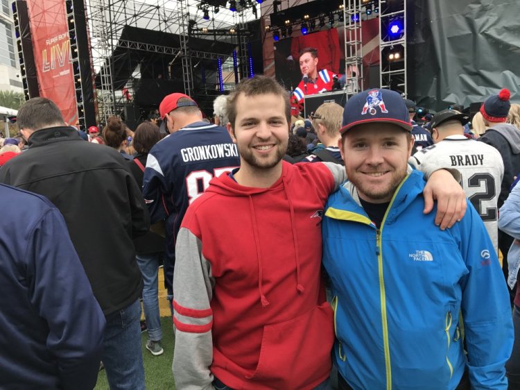 Shane Spink, left, of Eliot and Ashton Depasquale of York, both nuclear engineers at Portsmouth Naval Shipyard, attend the rally where country singer Scotty McCreery performed Saturday.