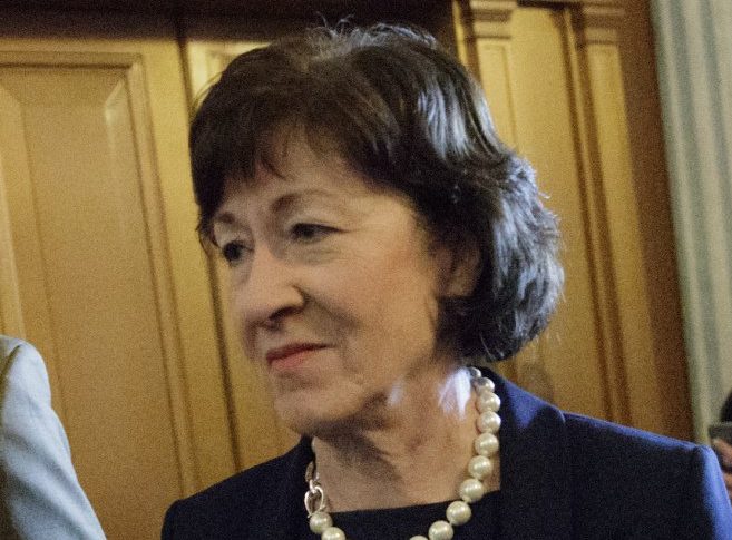 Sen. Susan Collins of Maine, who defected from the Republican majority, arrives at the Senate chamber Tuesday for the Senate vote on Education Secretary-designate Betsy DeVos. Vice President Mike Pence was needed to cast the tie-breaking vote to confirm DeVos.