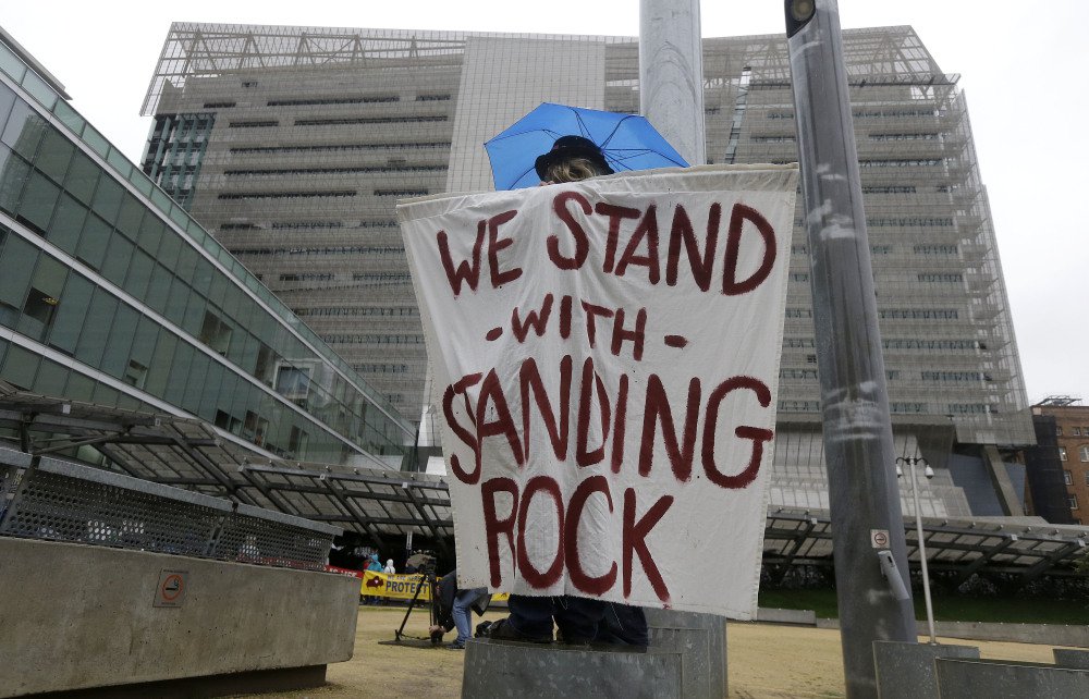 Opponents of the Dakota Access oil pipeline protest at the San Francisco Federal Building on Wednesday. Several people were arrested for blocking access to the building.