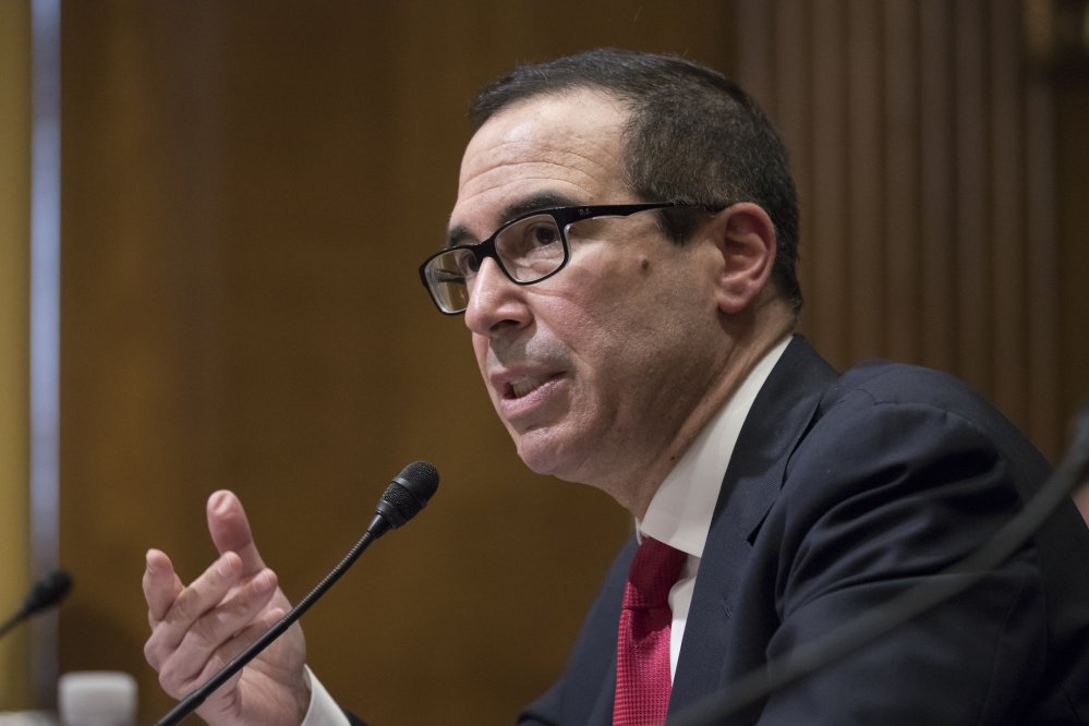 Steven Mnuchin testifies at his confirmation hearing Jan. 19 before the Senate Finance Committee. Mnuchin was confirmed by the Senate as treasury secretary on Monday evening.