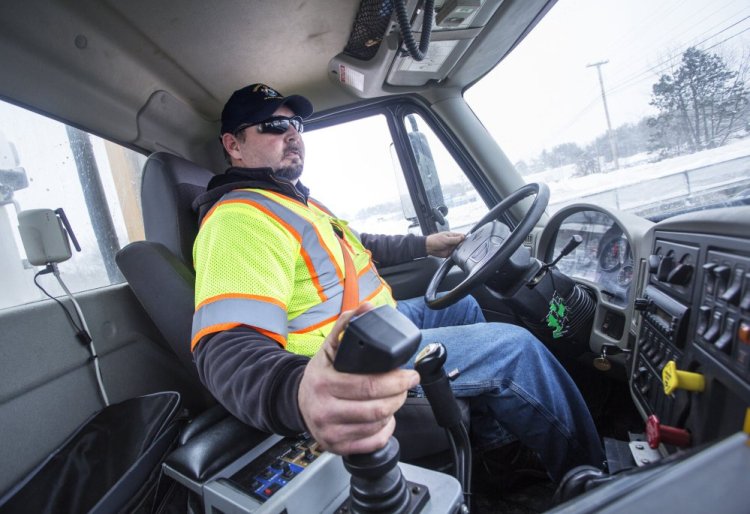 Gary Pelletier of the Maine Department of Transportation drives a snowplow truck Monday on Interstate 295 in Portland. The transportation department is working to solve a driver shortage in Cumberland and York counties.