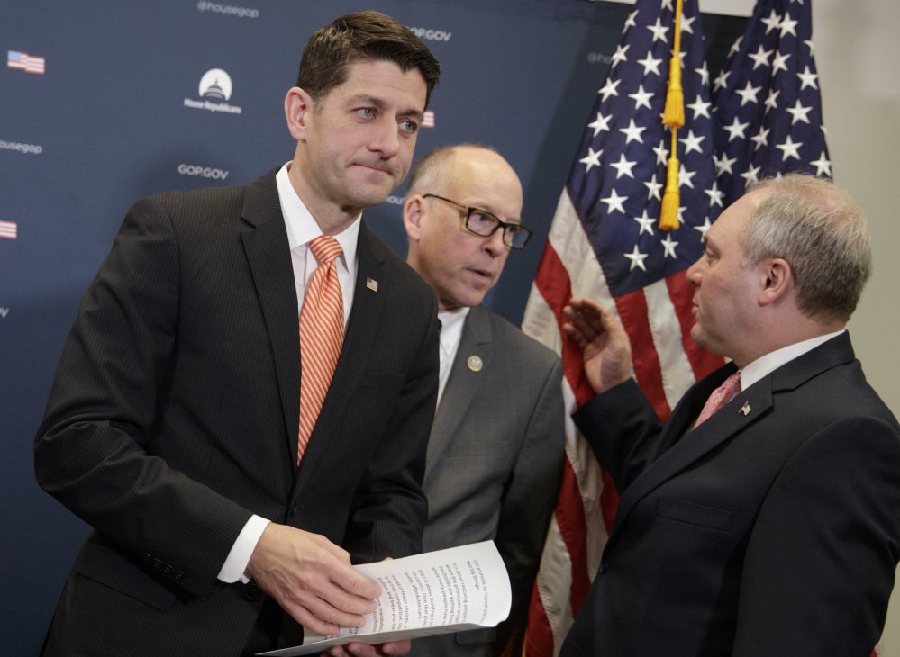 House Speaker Paul Ryan, R-Wis. – with House Majority Whip Steve Scalise, R-La., right, and Rep. Greg Walden, R-Ore. – leaves a news conference Tuesday in Washington.