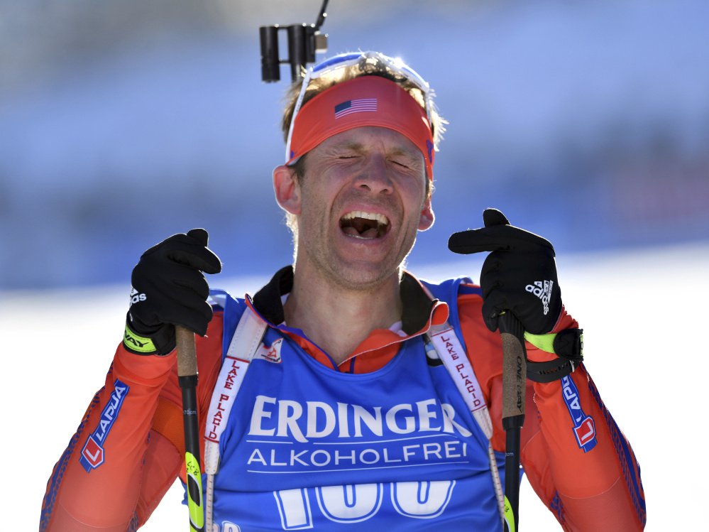 Lowell Bailey of the United States celebrates after the men's 20-K individual competition at the Biathlon World Championships in Hochfilzen, Austria on Thursday.