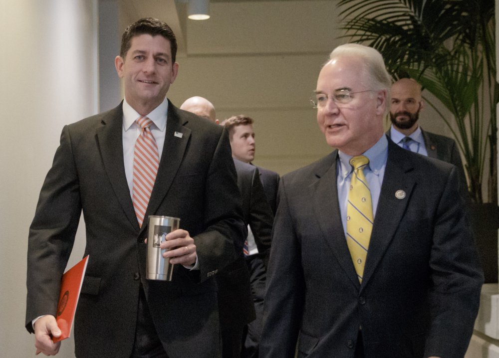 House Speaker Paul Ryan of Wisconsin arrives with Health and Human Services Secretary-designate, Rep. Tom Price, R-Ga. on Capitol Hill for a closed-door GOP strategy session.