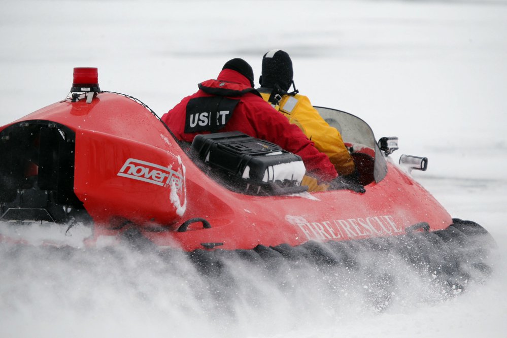 Rescue crews use a hovercraft Monday to search the frigid waters of Conesus Lake in Livonia, N.Y., for two missing snowmobilers who were believed to have fallen through the ice. Not-so-frozen lakes have claimed the lives of 10 snowmobilers across the Northeast so far in a relatively mild winter.