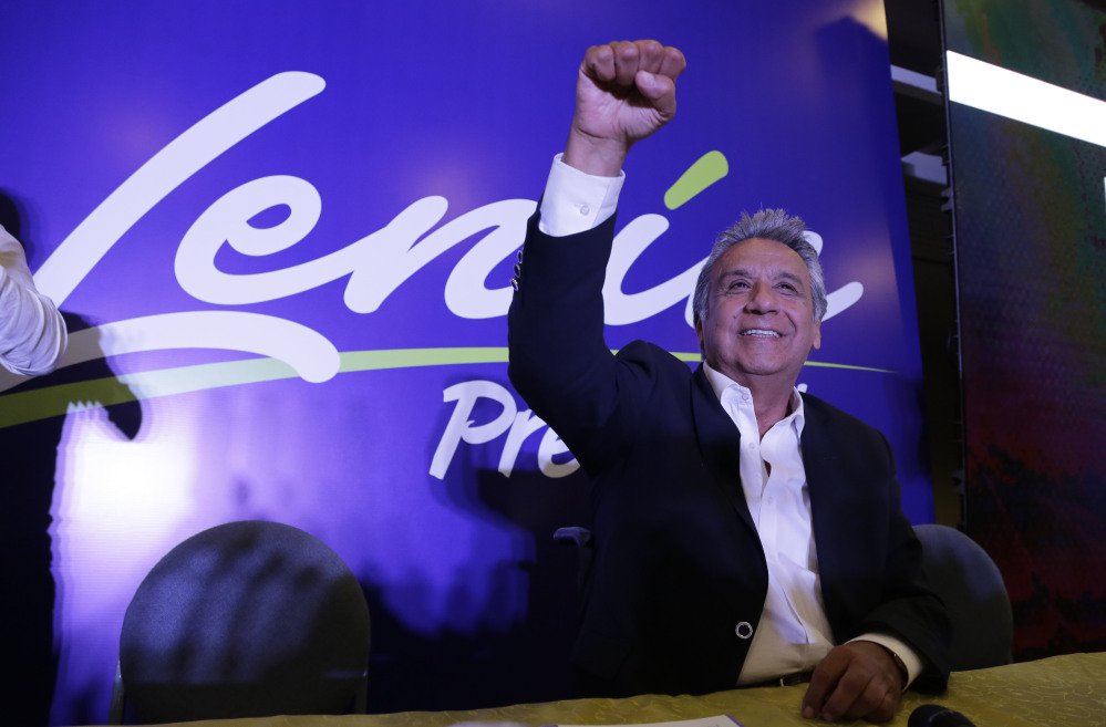 Lenin Moreno, presidential candidate for the ruling party Alliance PAIS, celebrates the closing of the polls for the general election Sunday in Quito, Ecuador.