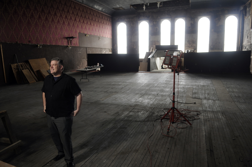 Mike Miclon, executive artistic director of Johnson Hall, stands in the third-floor theater space that he and others are working to raise money to renovate at Johnson Hall in Gardiner.