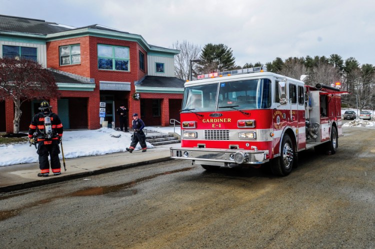 Gardiner firefighters leave River View Community School in Gardiner on Thursday afternoon after responding to a report of a small fire that the school staff had extinguished before they arrived.