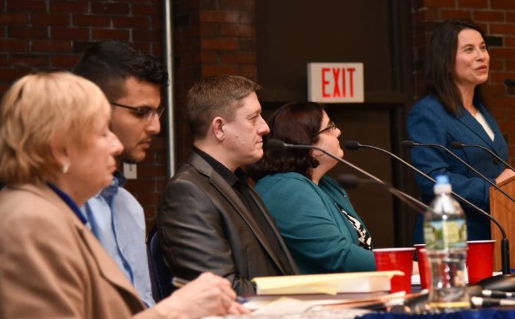 District Attorney Maeghan Maloney, right, opens a forum on discrimination Wednesday in the wake of Ku Klux Klan fliers placed in Augusta last week. The forum's featured speakers included, from left, Maine Attorney General Janet Mills; Ahmed Al-Abbas, owner of Mainely Groceries in Augusta and Hallowell; and University of Maine at Augusta professors James Cook and Lorien Lake-Corral. Not shown is Fatuma Hussein, the founder and executive director of the Immigrant Resources Center of Maine.