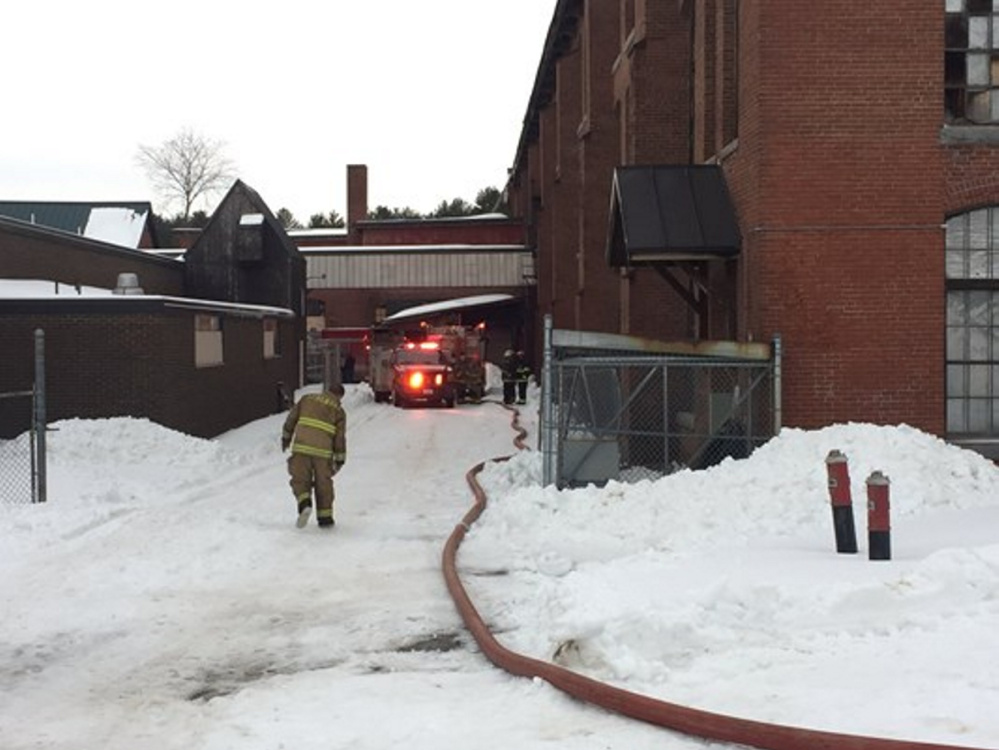 Firefighters respond to a fire Wednesday at the former San Antonio Shoe factory in Pittsfield.
