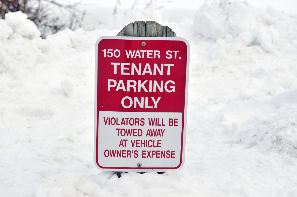 Tenants at 150 Water St. in downtown Hallowell have reserved parking spots, as seen Wednesday.