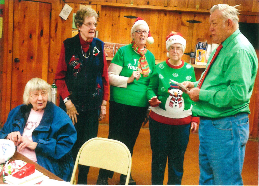 Past president David Smith, right, recently swore in the officers of the Four Leaf Clover Senior Club of Gardiner. From left, are Cathy Pazdziorko, chaplain; Beverly Heald, secretary; Johan Brown, president; and Marion Thomas, treasurer.