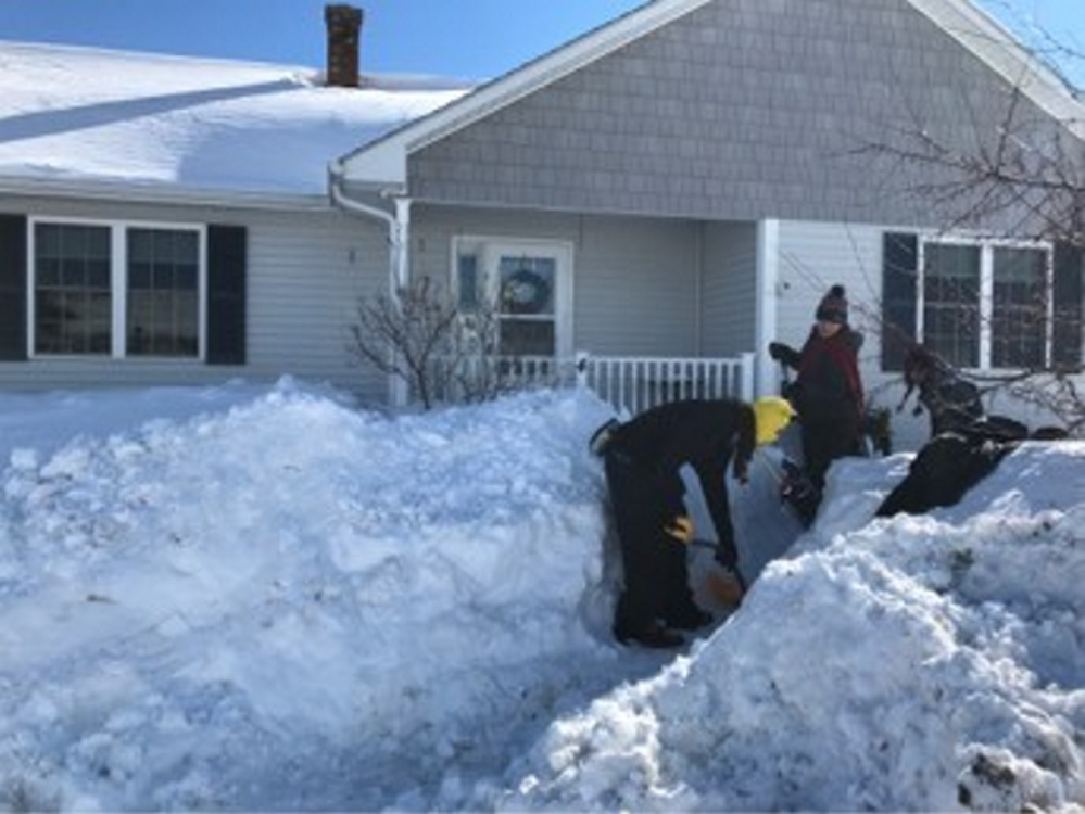 Winslow students volunteer to shovel snow for senior citizens