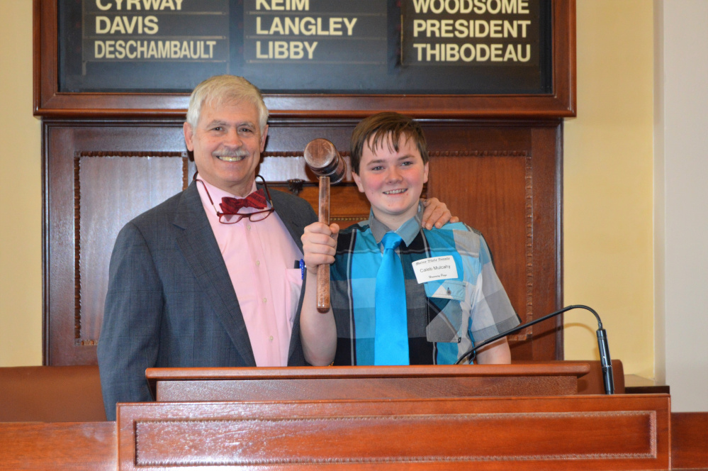 Caleb Mulcahy, of New Sharon, a 4-H member, served as an Honorary Page Feb. 2 at the Maine State House. With Mulcahy is Sen. Tom Saviello, R-Wilton.