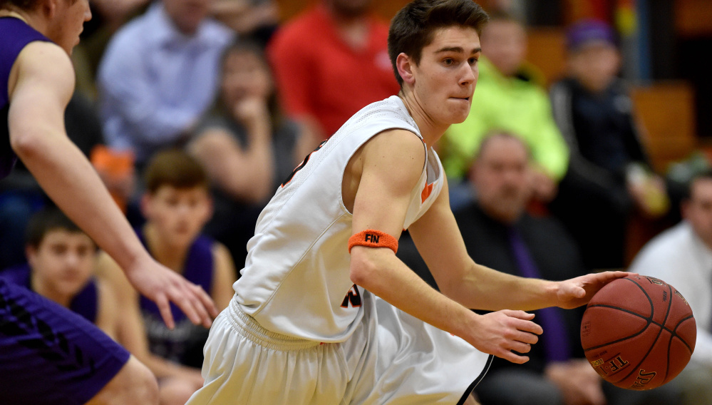 Skowhegan Area High School's Brendan Curran drives to the basket against Waterville earlier this season. Curran scored a game-high 17 points as the No. 8 Indians upset previously unbeaten No. 1 seed Medomak Valley in the Class A North quarterfinals Saturday night at the Augusta Civic Center.