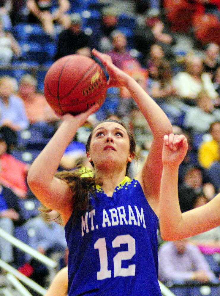Mt. Abram's Alora Ross shoots during a Class C South quarterfinal game on Monday at the Augusta Civic Center.