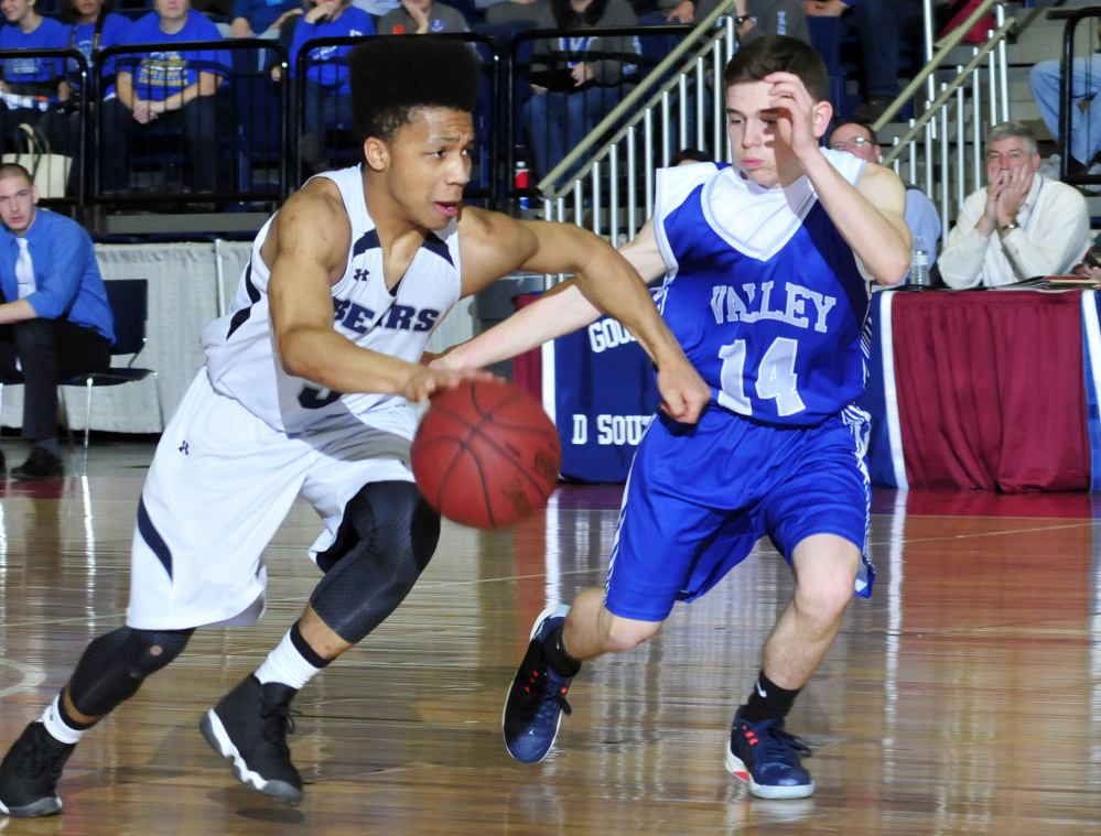 A.R. Gould's John Clement is pressured by Valley's Joey Thomas during a Class D South semifinal Wednesday at the Augusta Civic Center.