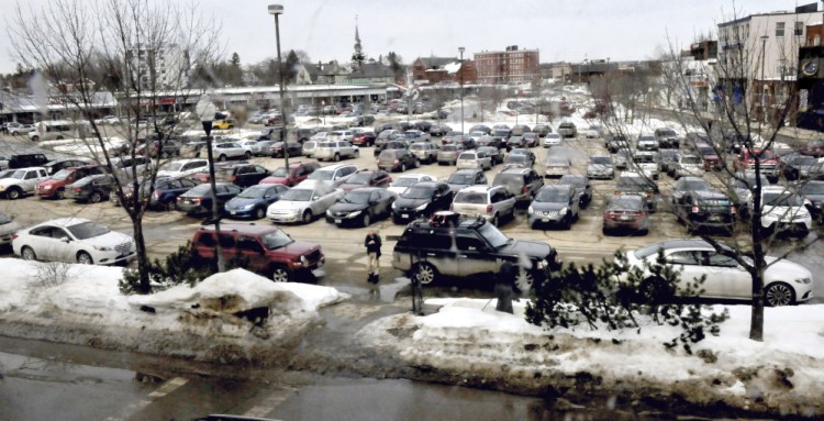 Cars fill up The Concourse parking lot in downtown Waterville on Wednesday, a day after city officials decided to create a new committee to examine parking issues in the downtown area.