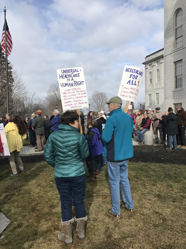 An estimated 200 people rallied near the State House in Augusta in support of the Affordable Care Act, also known as Obamacare, in February.