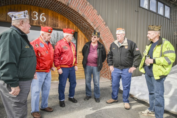 American veterans' group leaders meet outside the offices of the Kennebec Journal to discuss the decline in veterans' groups membership. They are, left to right, James Laflin, U.S. Army retired, AMVETS National Executive Committee representative, commander of the AMVETS Post 2001 in Augusta, and a past commander of department of Maine AMVETS; Ralph Sargent, U.S. Marine Corps retired, senior vice commandant of Marine Corps League Kennebec Valley Detachment 599 and junior vice commandant of Veterans of Foreign Wars Post 9 in Gardiner; Bill Schultz, U.S. Navy retired and commandant of Marine Corps League Kennebec Valley Detachment 599; Roger Paradis, U.S. Navy retired and adjutant, historian and Americanism coordinator for American Legion Smith-Wiley Post 4 in Gardiner; Roger McLane U.S. Navy retired, Commander VFW Post 9 in Gardiner and member of American Legion Post 181 in Litchfield; and Eric Hunt, U.S. Navy Retired, past commander of Winslow VFW Post 8835 and an associate member of Marine Corps League Kennebec Valley Detachment 599.
