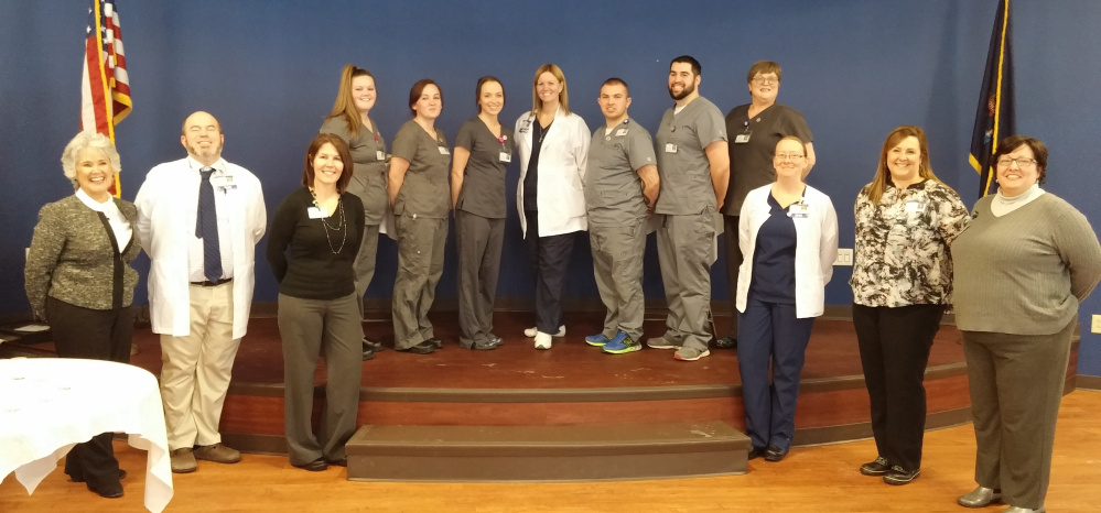 In front, from left, are Development instructor Kathleen Lewia, Classroom Instructor Chris Miller, R.N., Administrator Shannon Lockwood, Clinical Instructor Desiree Knowles R. N., Administrator Megan Stiles and Public Relations/Marketing Director Tami Thibodeau. In back, from left, are Chelsea George, Courtney Fraser, Alexandria Hansen, Director of Nursing Patty Shuck R.N., Zachary Fontana-Howe, Darren Gilbert and Gloria Weeks.