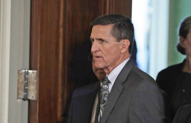 Michael Flynn appears in the East Room of the White House Monday for a joint news conference with President Donald Trump and Canadian Prime Minister Justin Trudeau. Later in the day, Flynn later resigned as Trump's national security adviser. 