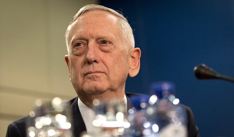 U.S. Secretary of Defense Jim Mattis waits for the start of the North Atlantic Council at NATO headquarters in Brussels Wednesday. For Mattis, the next few days will be a reassurance tour but is  also aiming to secure bigger defense spending commitments. 