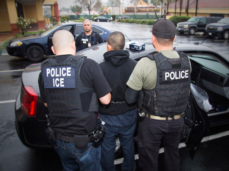 This photo taken Feb. 7, 2017, released by U.S. Immigration and Customs Enforcement, shows an arrest being made during a targeted enforcement operation conducted by U.S. Immigration and Customs Enforcement (ICE).