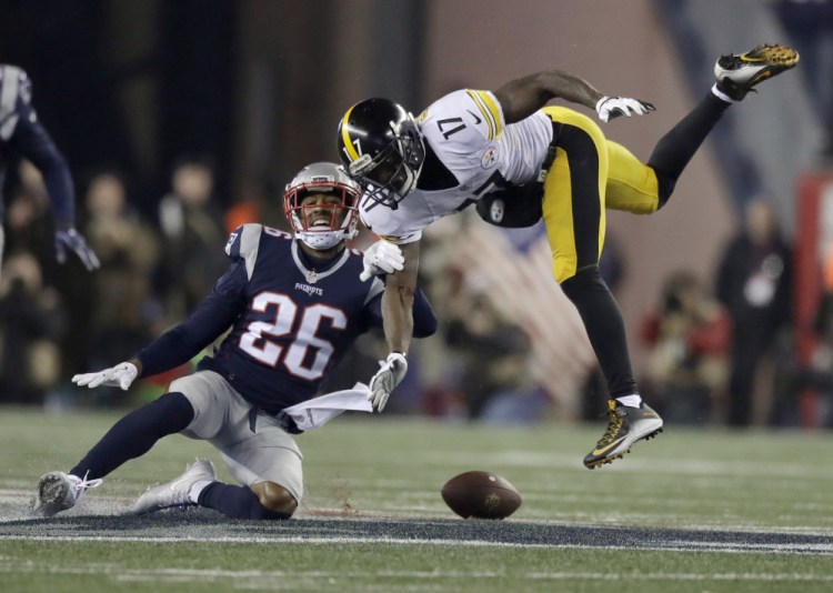 Patriots cornerback Logan Ryan breaks up a pass intended for Steelers wide receiver Eli Rogers during the second half of the AFC playoff game on Jan. 22.