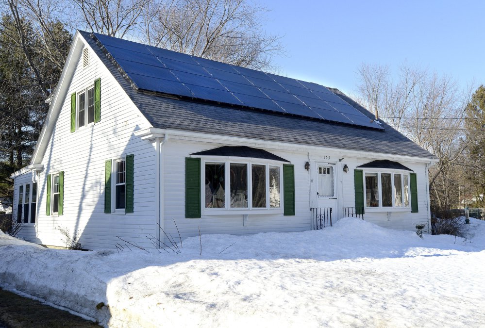 New solar power rules scheduled to go into effect in 2018 would scale back the energy credits received by homeowners who already have panels after 15 years, possibly including this home at 103 Wolcott St. in Portland.