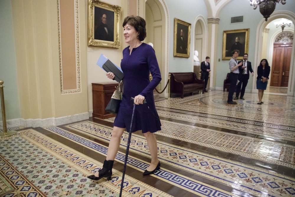Sen. Susan Collins, R-Maine, arrives for a meeting of Republican members of the House and Senate to discuss replacing the Affordable Care Act, nicknamed Obamacare, which was a campaign promise of Donald Trump, on Capitol Hill in Washington, Wednesday, March 1, 2017. Collins uses a cane as she recovers from a broken ankle.