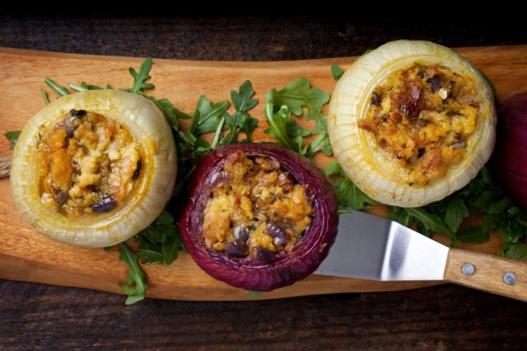 Onions stuffed with herbs and cheese. Onions offer a wealth of possibilities: gently stewed until mild and sweet, caramelized or slowly simmered until silken and creamy.
